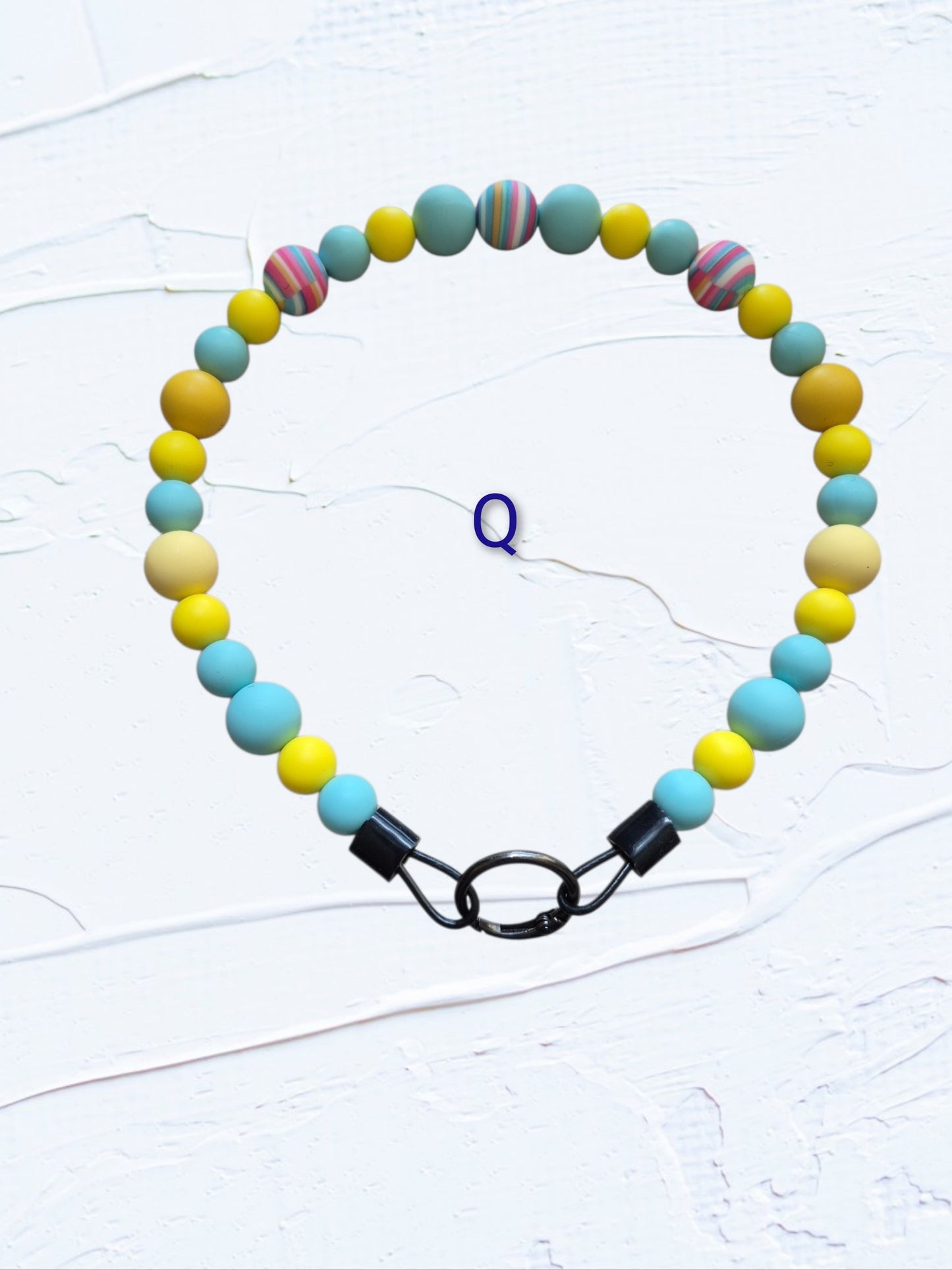 18 inch silicone beaded dog collars handmade in Canada – group shot showing Colour O in teal, navy, grey and white, Colour P in purple and lavender, and Colour Q in teal and yellow, with O-ring clasps