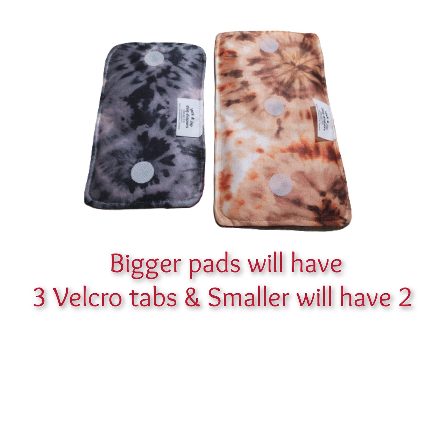 "Double-sided Velcro tabs on washable dog diaper pad for secure attachment"