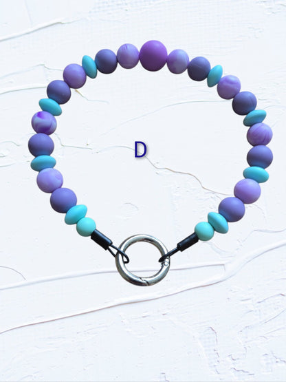 purple and turquoise beads with a silver O-ring clasp