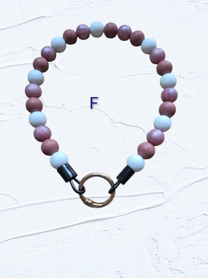 14 inch silicone beaded dog collar Colour F – alternating mauve and light blue silicone beads with gold O-ring clasp, handmade in Canada
