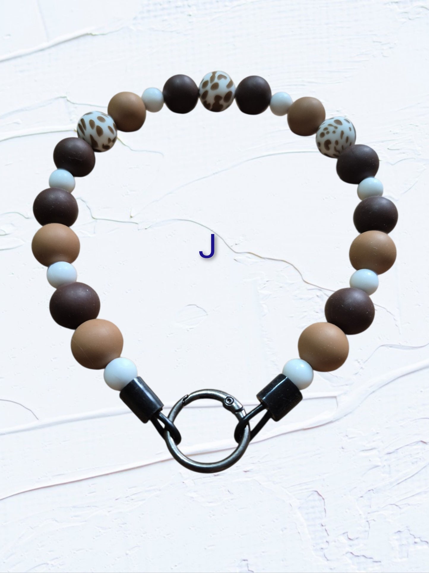 15 inch silicone beaded dog collar Colour J – brown, tan and light blue beads with leopard print accent beads and silver O-ring clasp, handmade in Canada