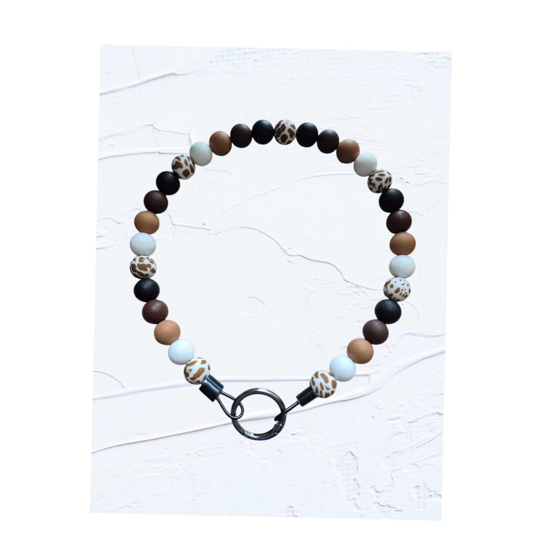 21 inch silicone beaded dog collars handmade in Canada – group shot showing Colour V in black, brown and leopard print and Colour W in blue tones, with O-ring clasps